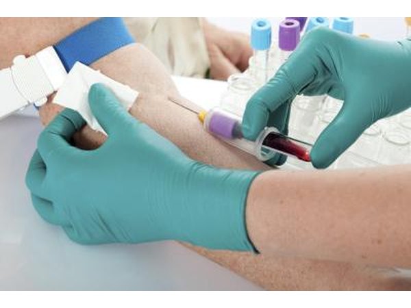 Woman having blood tested before becoming donor