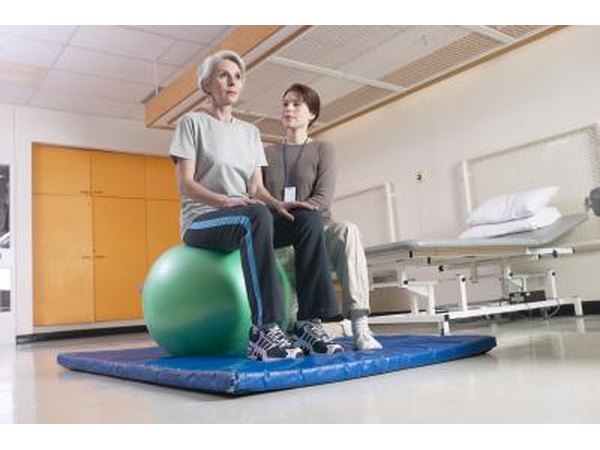Woman with physical therapist