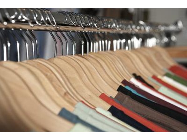 Clothes hanging on a rack.