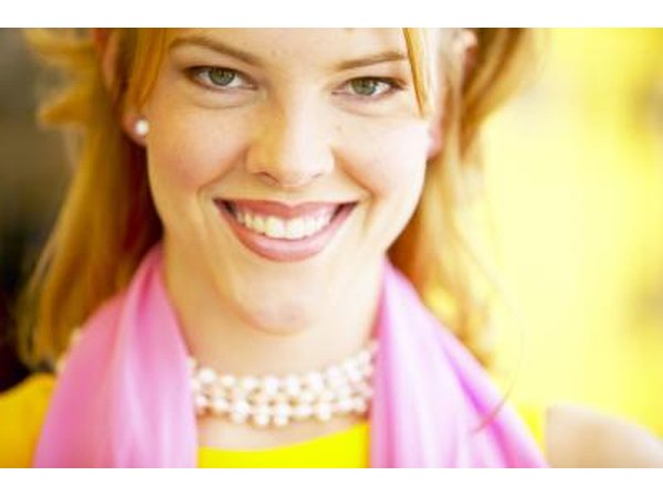 Scarves and jewelry are gifts that can accentuate her style.