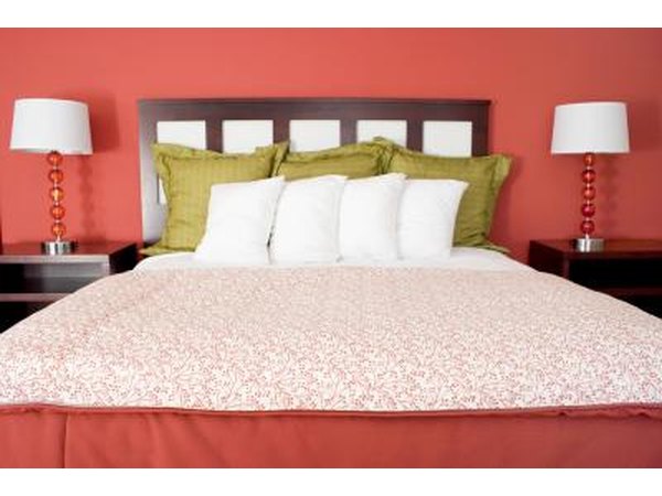 Bedroom with tangerine inspired walls.