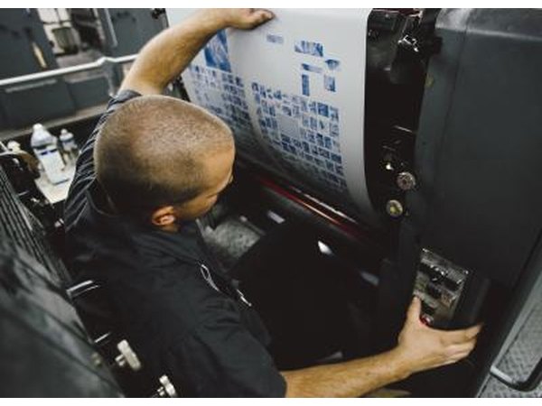 Publisher at printing press.