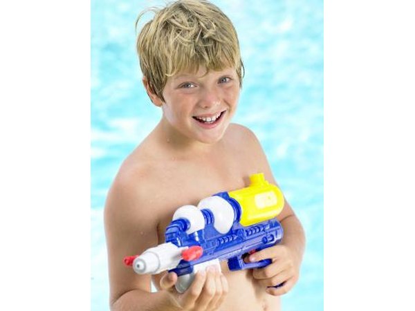 Boy with water gun