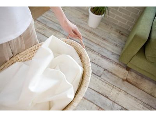 If other people are living in your house, do not wash their bedding or other fabrics in with your bedding and garments.