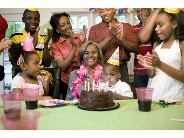 Senior woman celebrating with family