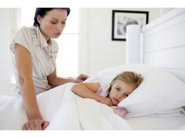 Sick daughter in bed