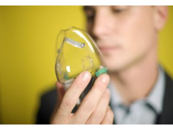 Man holding oxygen mask