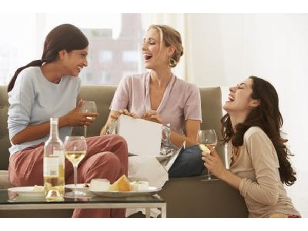 Friends exchanging gifts at party
