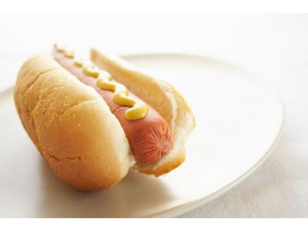 A high sodium hot dog on a plate.