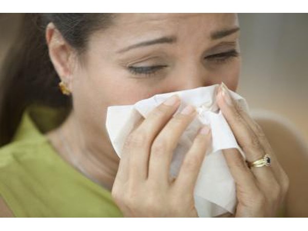 crying woman blowing her nose