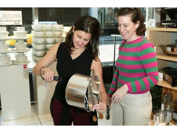 Brides scan items for wedding registry in store