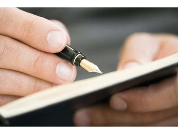 Man writing with pen