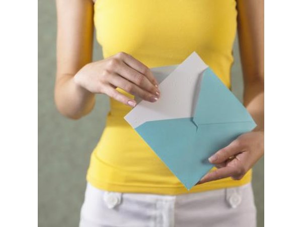 Woman holding card
