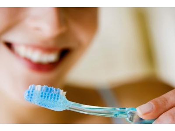 Woman brushing her teeth