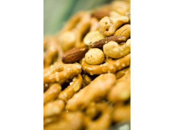 Nuts and pretzels may leave remnants in your mouth long after you eat.
