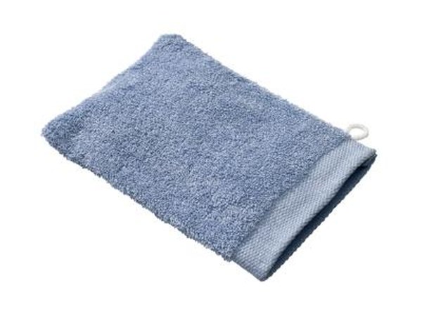 Apply a warm washcloth or heating pad set on medium to the affected ear every few hours