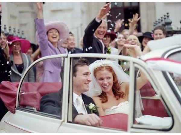 Women can wear a suit and hat for a more formal afternoon wedding.