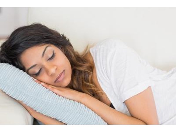 Woman resting on couch