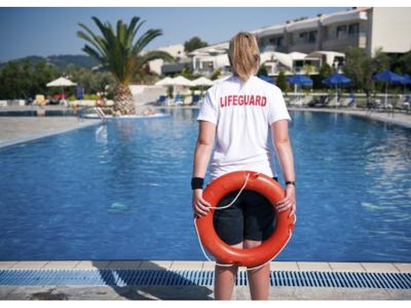 The lifeguard is on duty for the enforcement of rules and safety precautions.