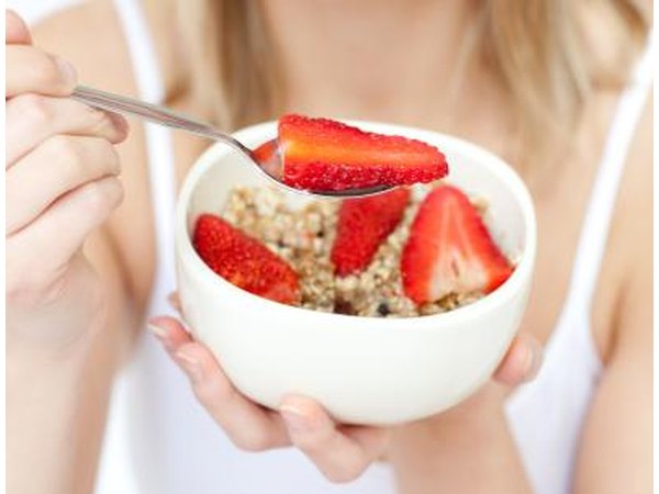 A 130 pound woman should aim to eat about 1630 calories per day.
