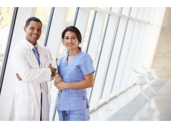 nurse standing beside doctor