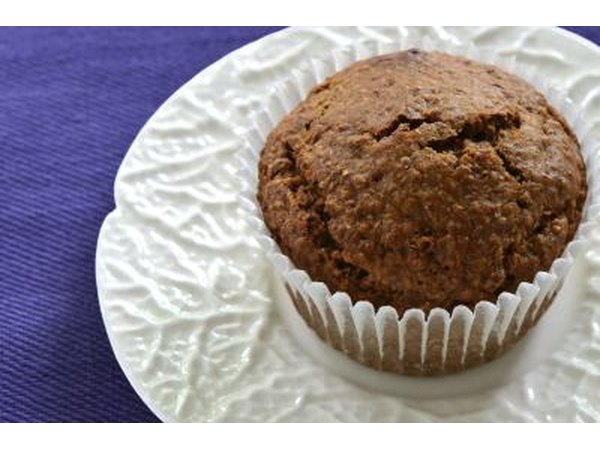 Bran muffin on a plate.
