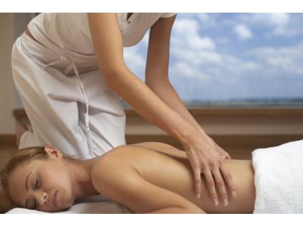 Woman getting a mid back massage
