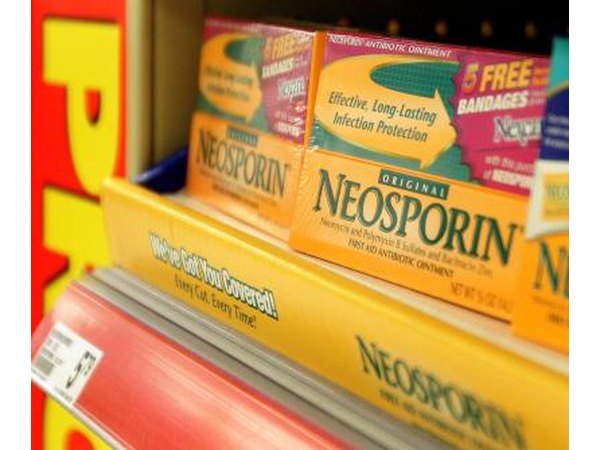 Neosporin can be applied to the wound area after it has been cleaned.