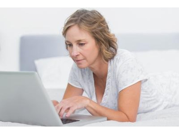 Woman researching about hormone replacement therapy