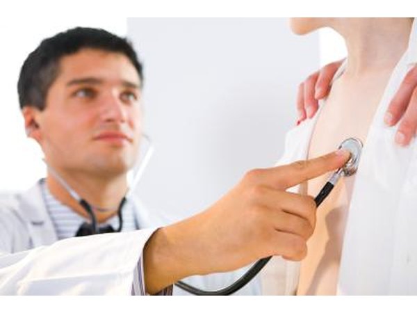 doctor listening to patient's heart