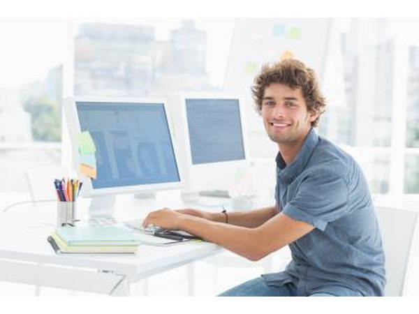 Young man working on computers