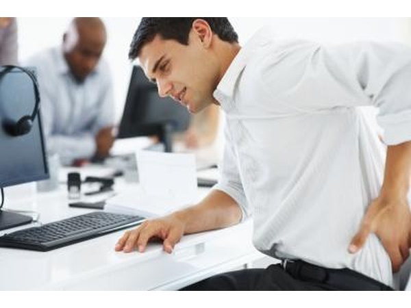 Sitting for long periods can cause the psoas tighten and pull on the lower spine.