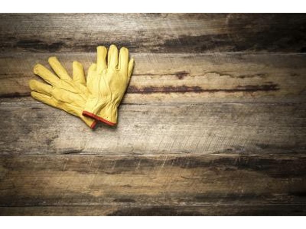 Turn off the pool filter and put on rubber gloves and protective eye goggles.