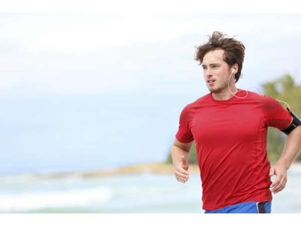 Man jogging on beach