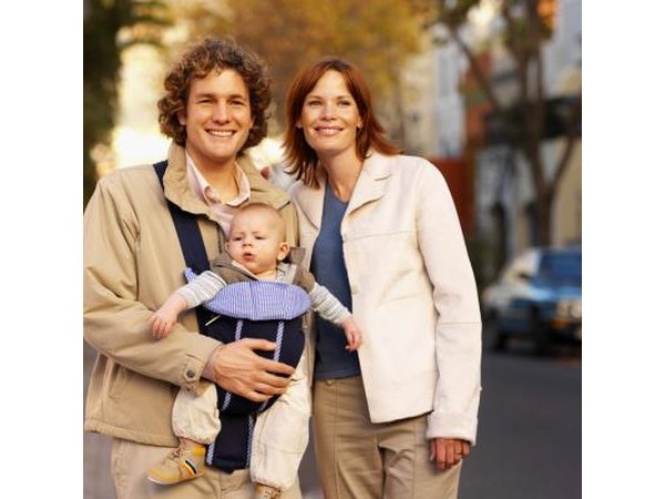 Baby wearing layers of clothing.