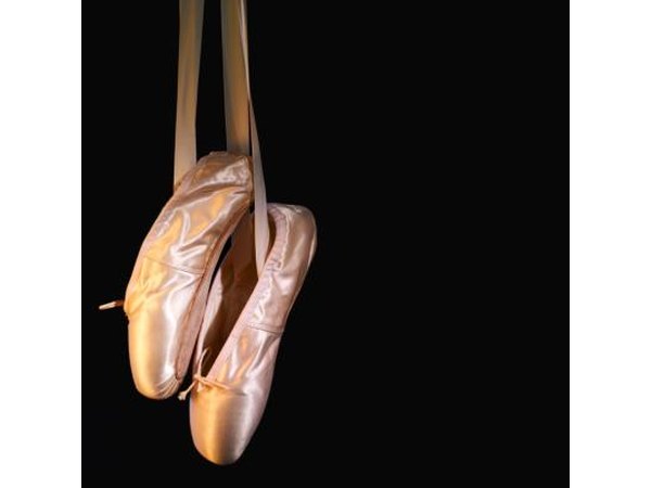 Light pinks, like those commonly used for ballet shoes, work well with the warm tones in oak wood