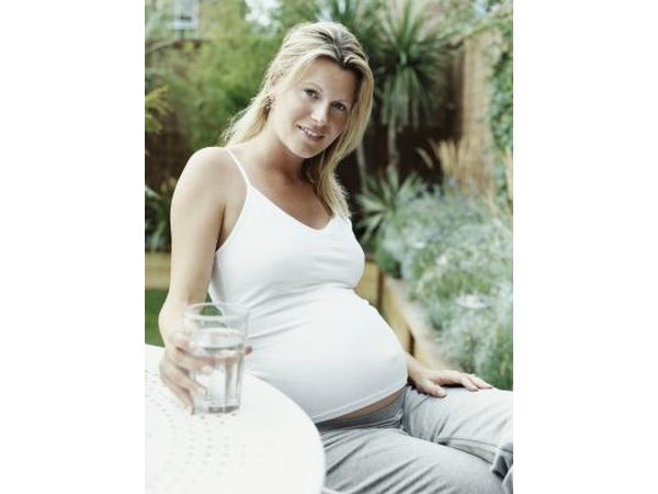 Pregnant woman drinking water