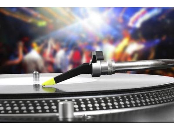 DJ's record playing at party