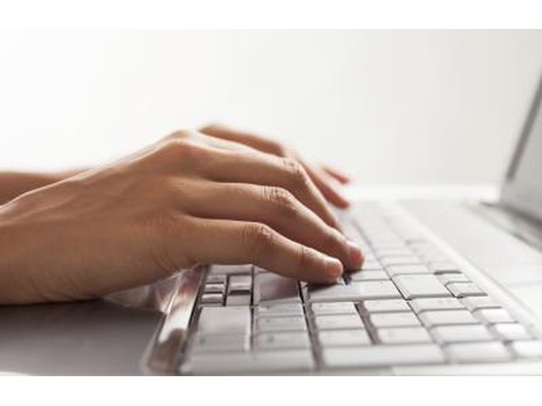 Man typing on keyboard