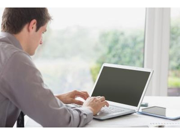 man on computer