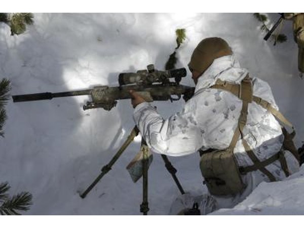 Sniper practicing in the snow