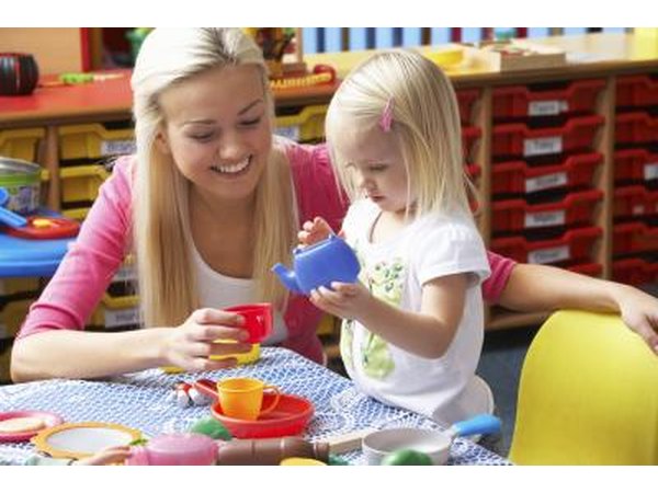 Kindergarten teacher with student