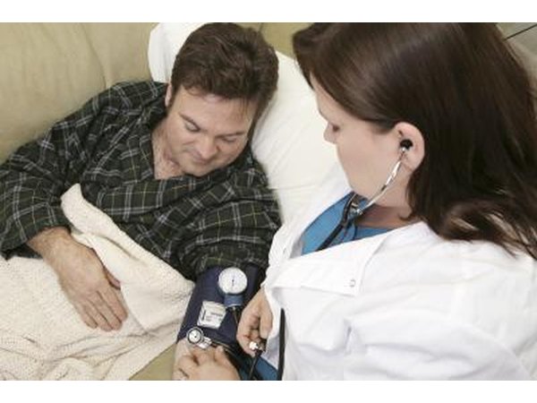 Nurse with patient at home.