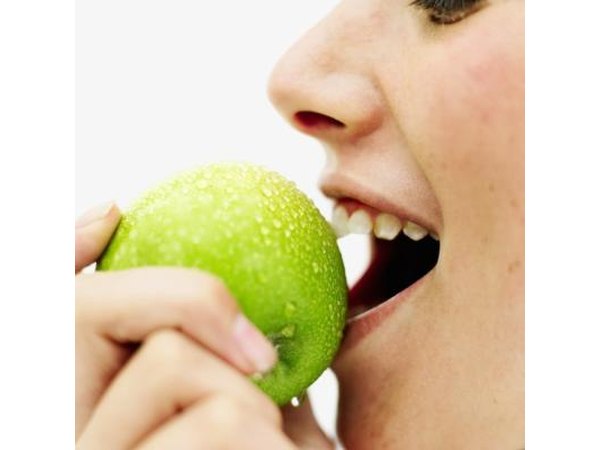 Apples are abrasive and help lift stains.