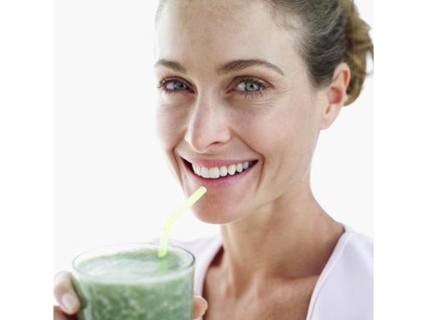 Woman with green juice.