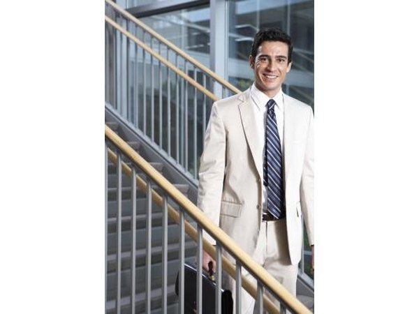 Find a light-colored suit or jacket to layer over your T-shirt.