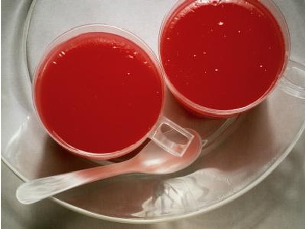 Two cups of red gelatin.