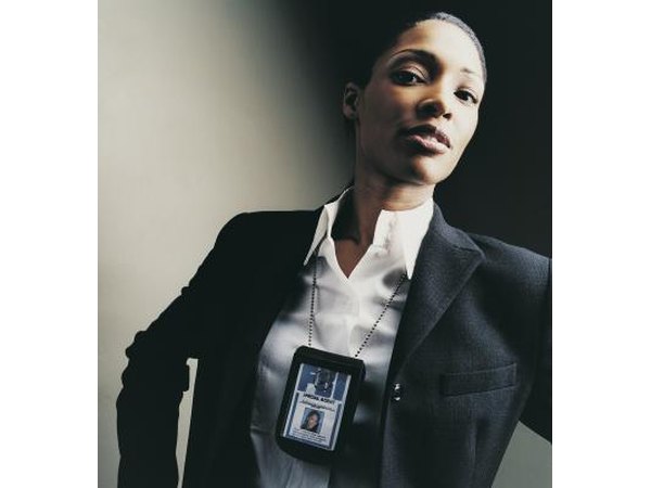 A portrait of a female FBI agent with ID card.
