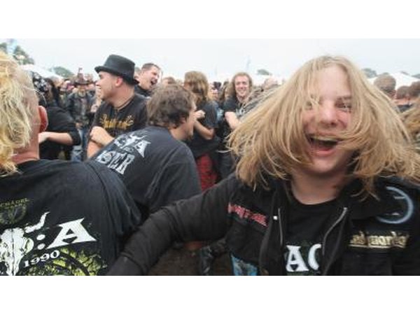 Heavy metal fans slam dance in mosh pit