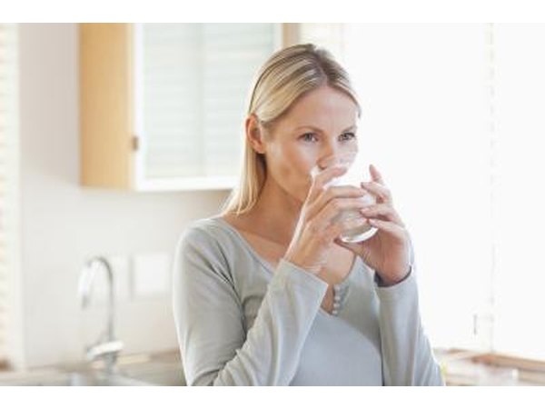 Woman drinking glass of water